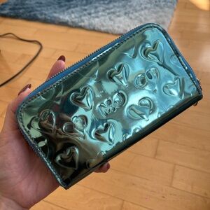 Marc by Marc Jacob’s Metallic Heart zip wallet.